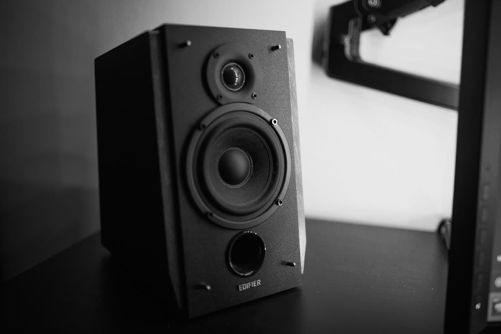 A bookshelf speaker on a stand