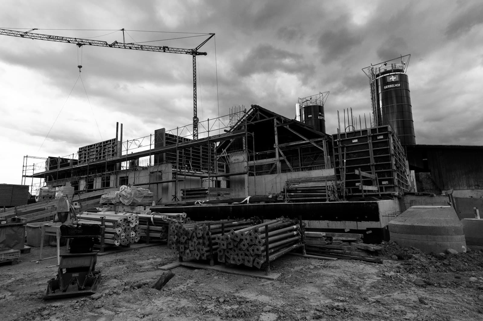 A building under construction with a crane