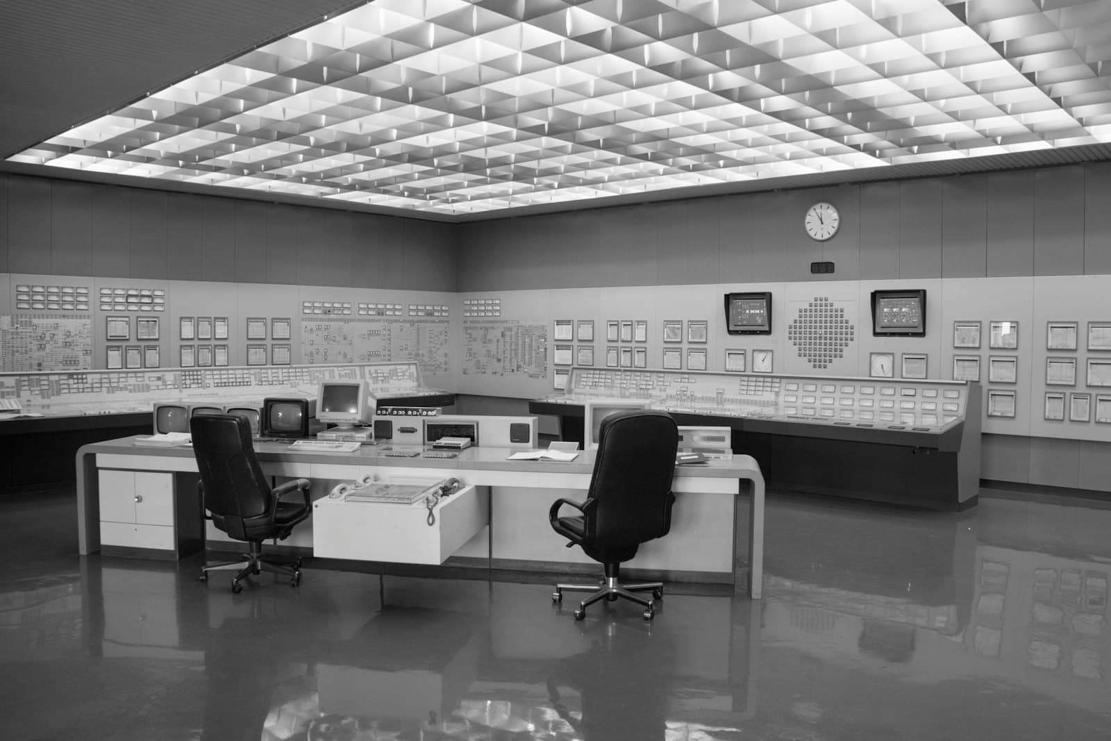 A monitoring control room with desks and chairs