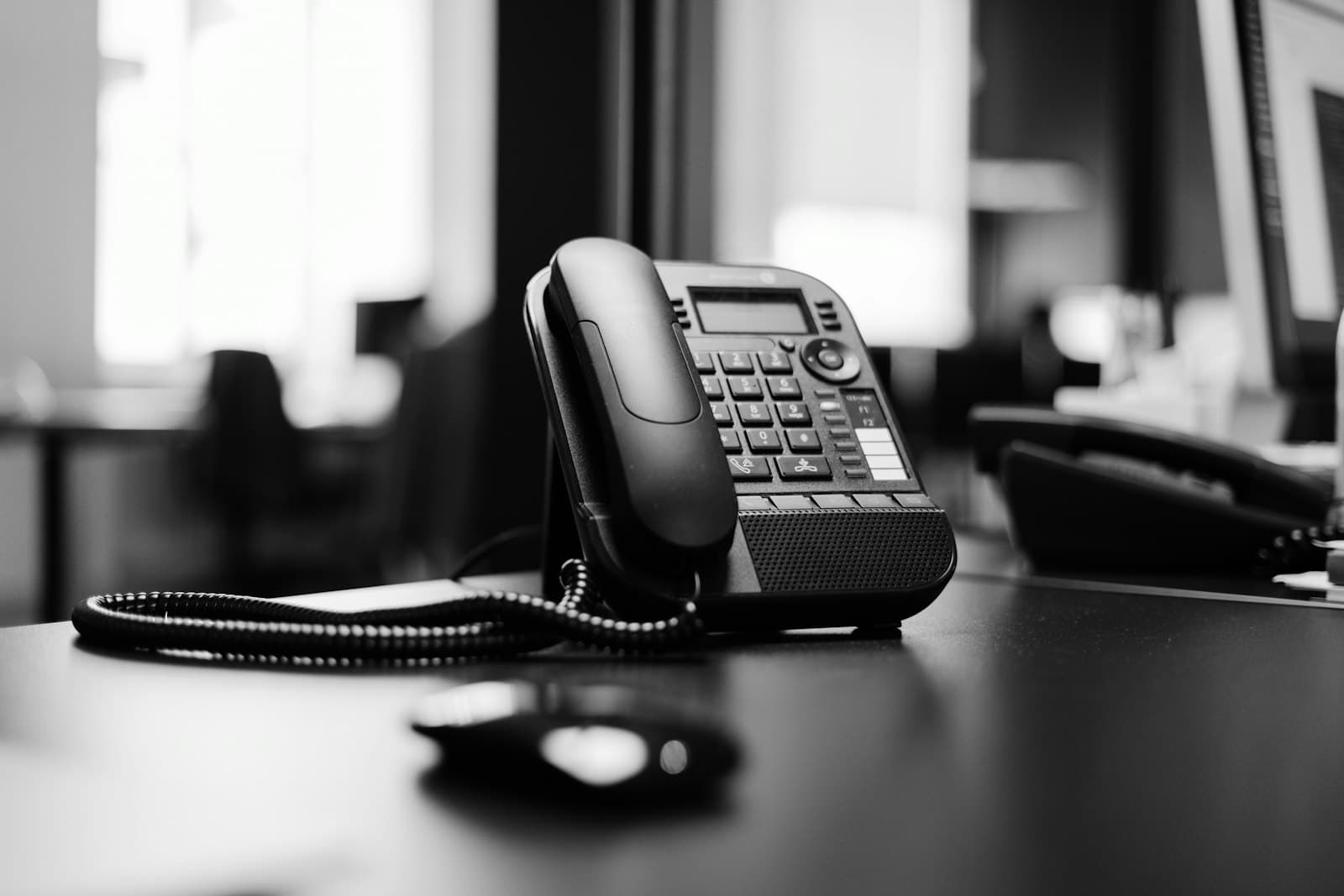 A desk phone in an office