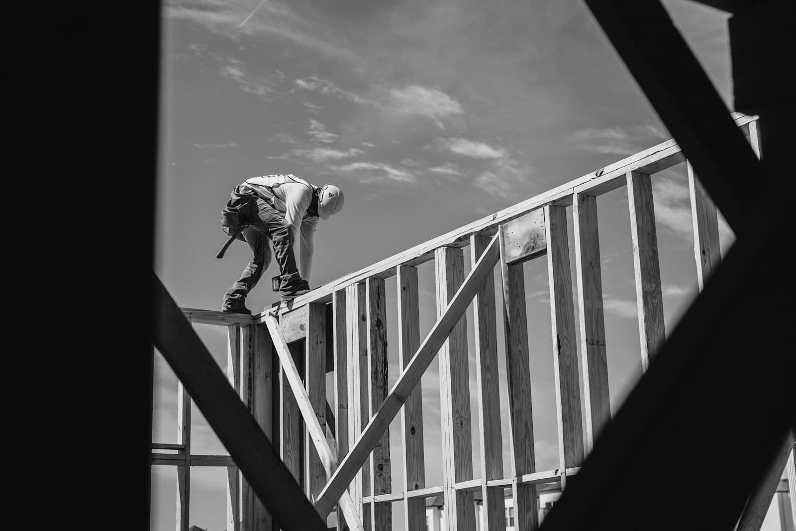 A builder on timber house framing