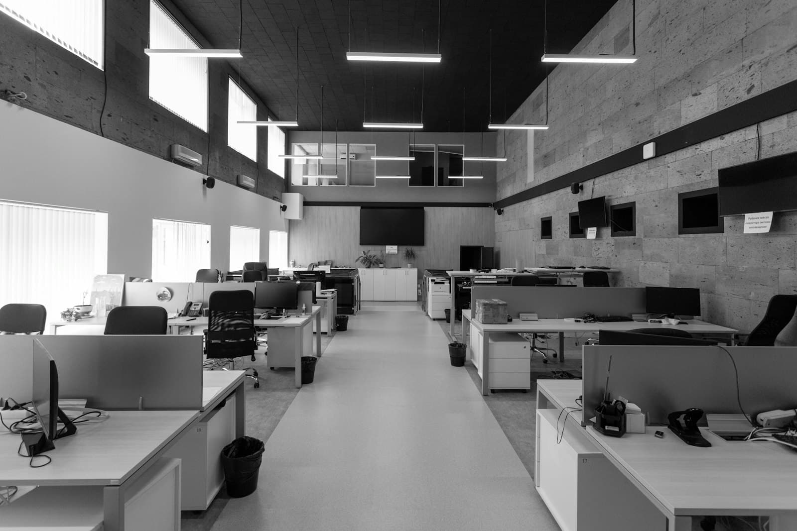 An open-plan office with rows of desks