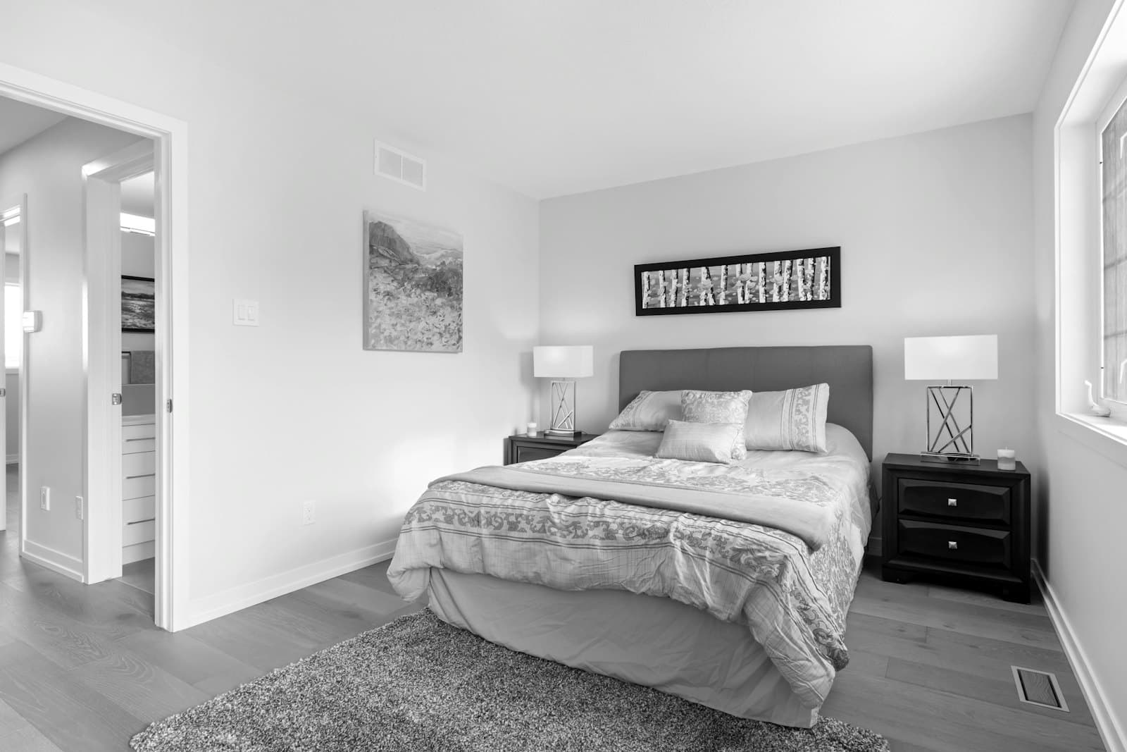 A bright, simply furnished bedroom