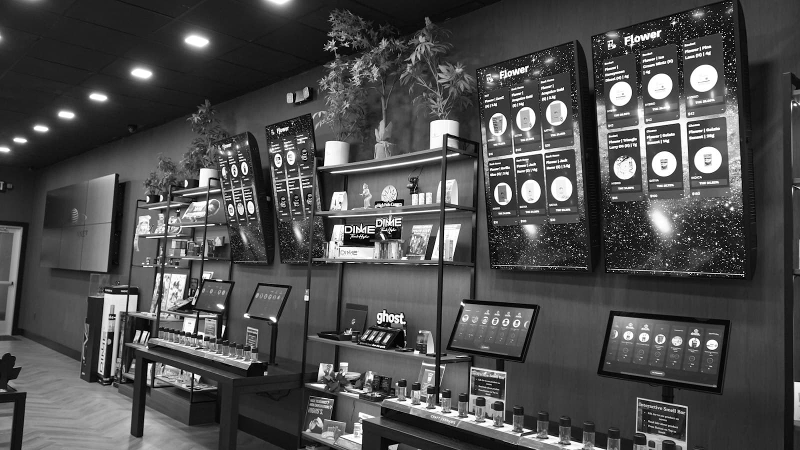 A retail store wall of digital screens